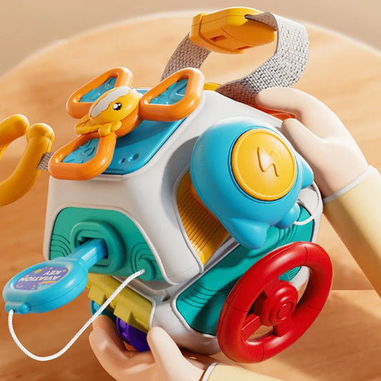 Busy Board Cube Montessori Bébé – Jouet Éducatif Sensoriel Motricité Fine | 5 Modèles | Voyage